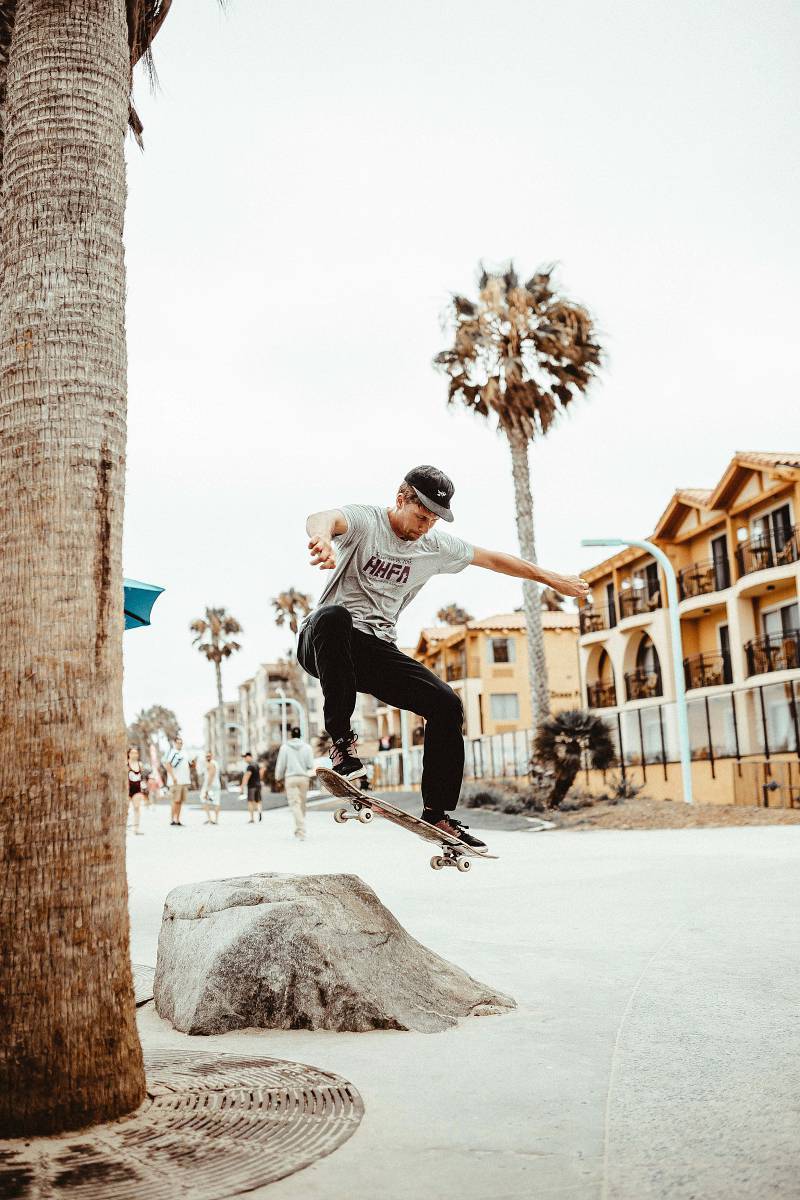 san diego man playing skateboard tricks on the rock during daytime united states